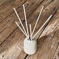 ceramic reed diffuser on table